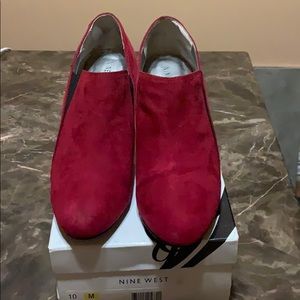 Red w/black trim suede 3 1/2 heels.